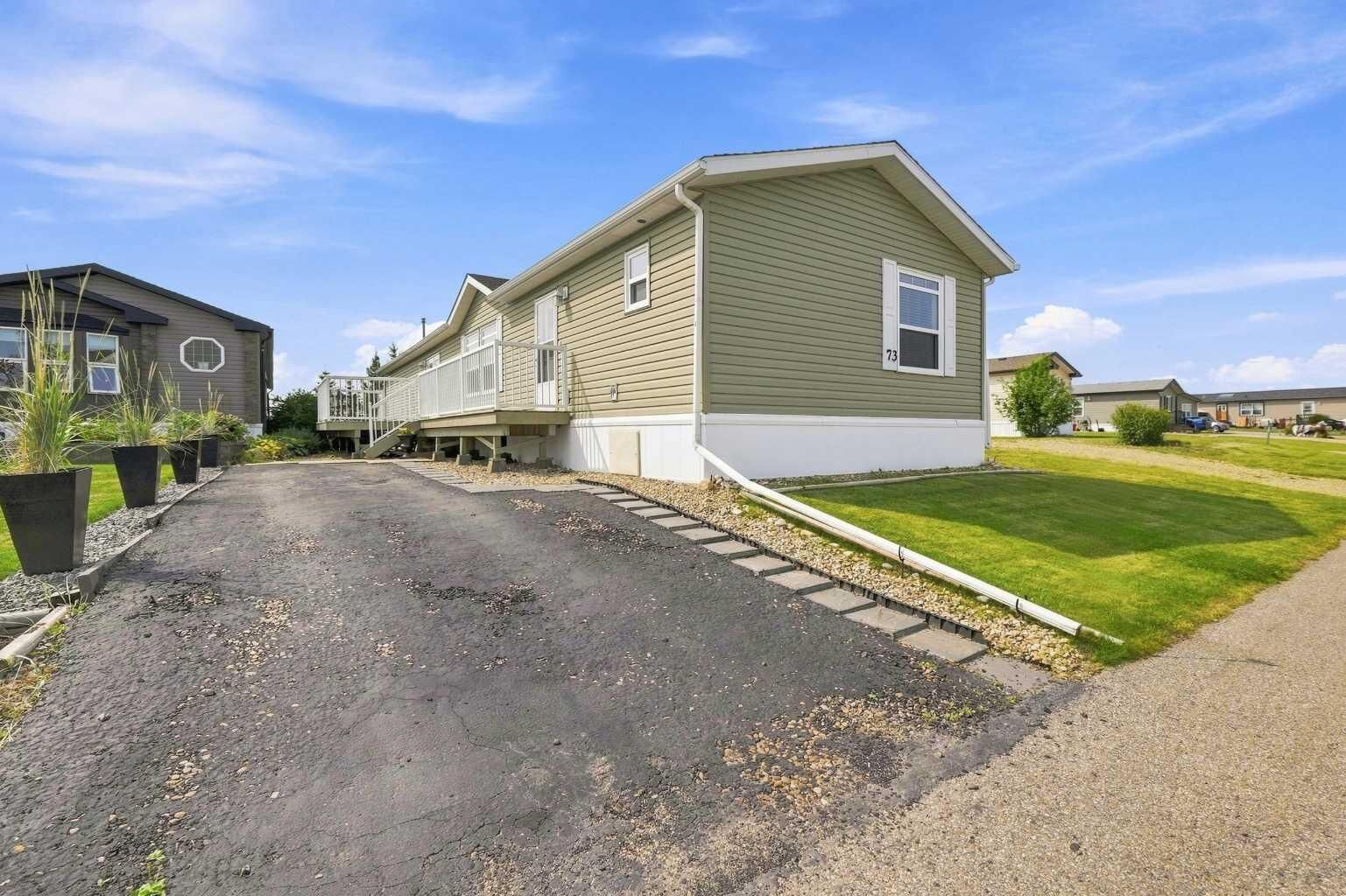 Property Photo: 15 Mackenzie Ranch Way 73 AB T4L 0B4