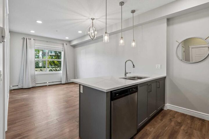 Property Photo: 19621 40 Street SE 108 AB T3M 3B2