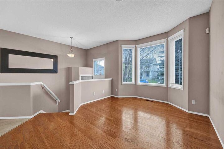 Property Photo: 231 Tuscany Drive NW AB T3L 2H9