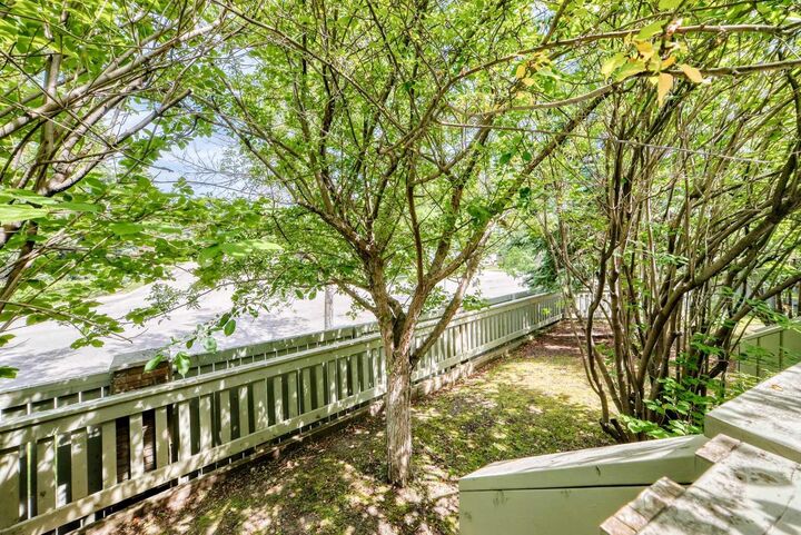 Property Photo: 185 Woodridge Drive SW 3 AB T2W 3X7