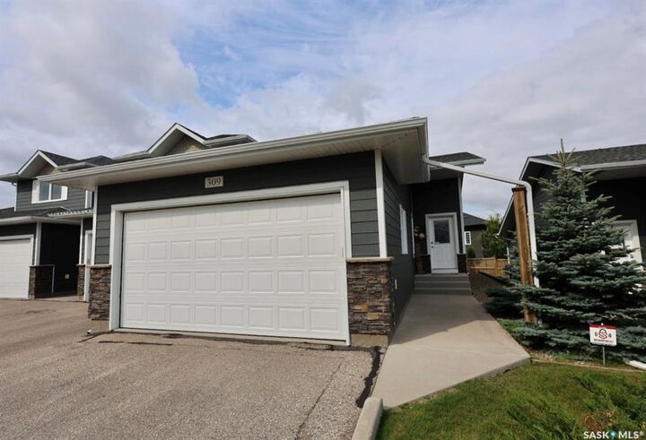 Property Photo: 1851 Pederson Drive 309 SK S6X 0B2