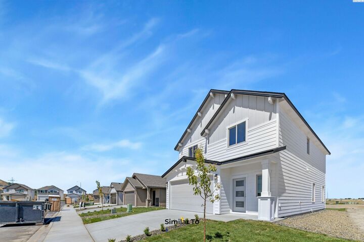 Property Photo:  710 Honeylicious St.  WA 99352 