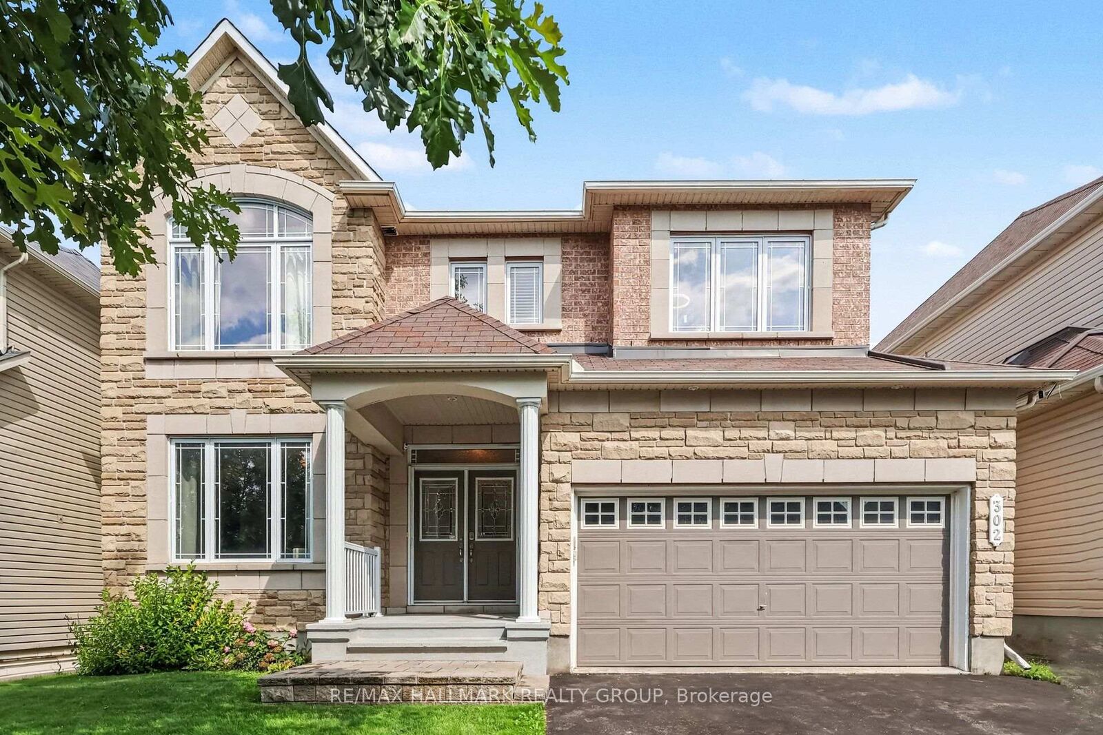 Property Photo: 302 Grayburn Way ON K2J 0V8
