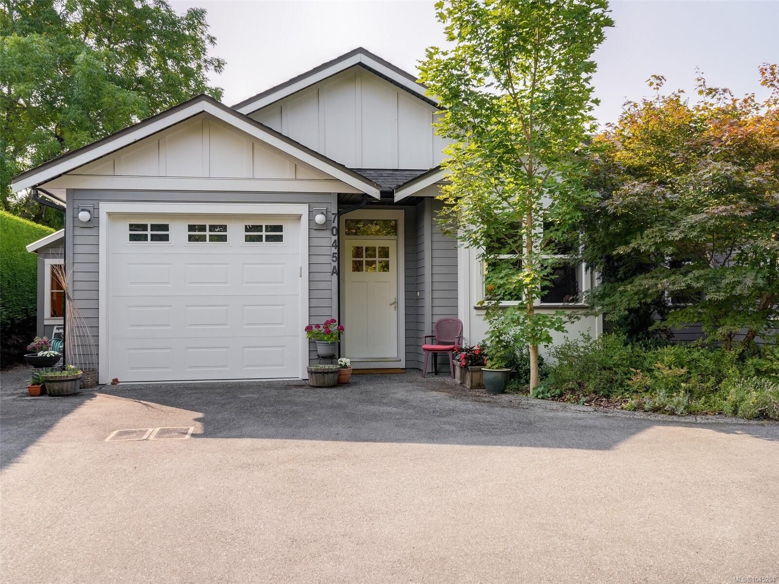 Property Photo: 7045 Wallace Dr #A BC V8M 1E9