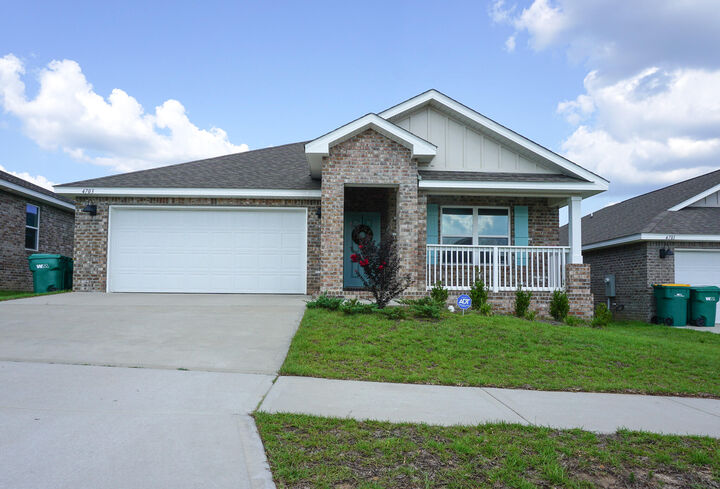 Property Photo:  4703 Airmen Drive  FL 32539 