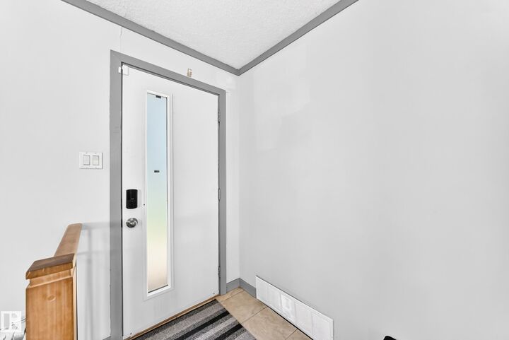 Property Photo: 12253 94 Street NW AB T5G 1K2