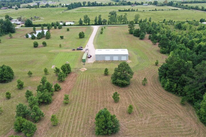 Property Photo: 1955 County Road 2281 TX 77327