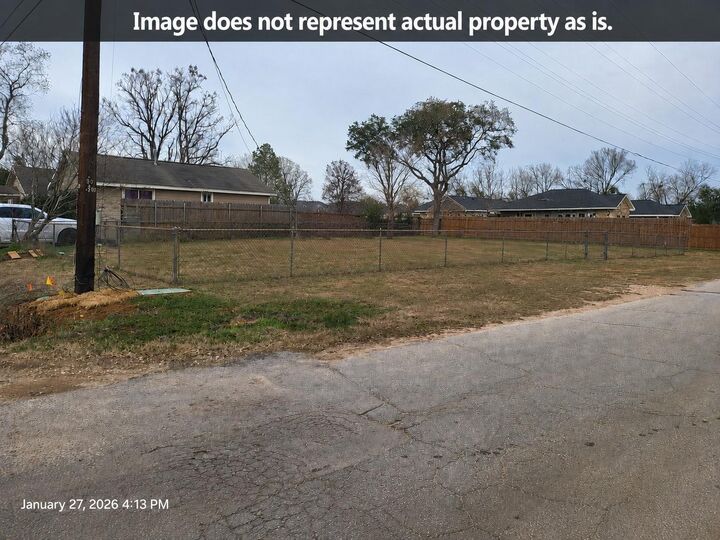 Property Photo: 206 1st Street TX 77378