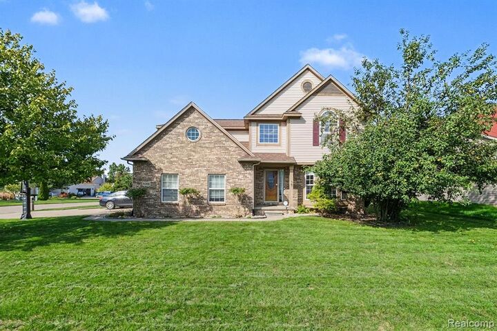 Property Photo:  8366 Sherwood Drive  MI 48439 8391 