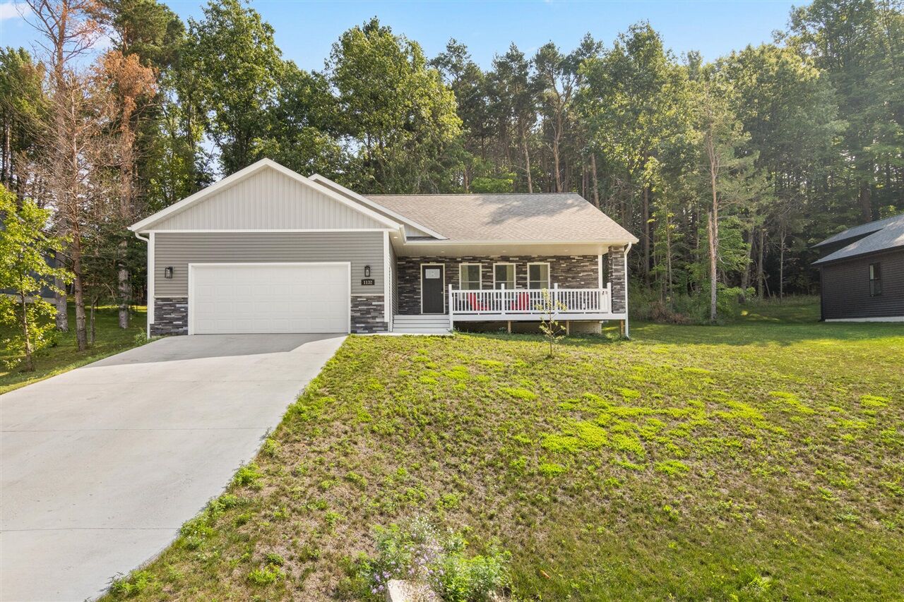 Property Photo:  1132 Farmington Drive  MI 49696-8858 