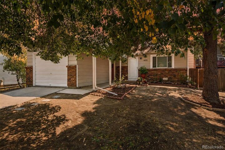 Property Photo: 4955 S Quintero Circle CO 80015