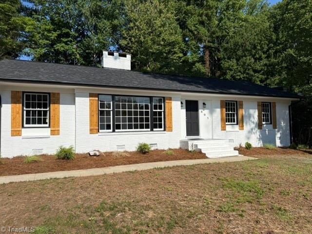 Property Photo:  805 Plummer Drive  NC 27410 