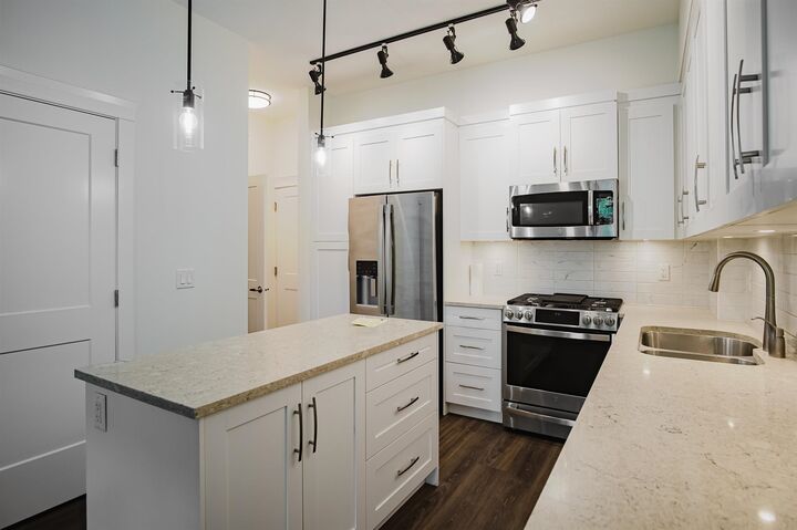 Property Photo:  11077 Ravine Road 4  BC V3T 0R7 