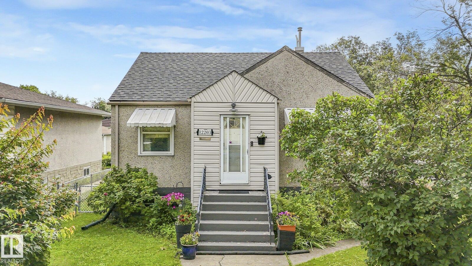 Property Photo:  12203 126 Street NW  AB T5L 0W9 
