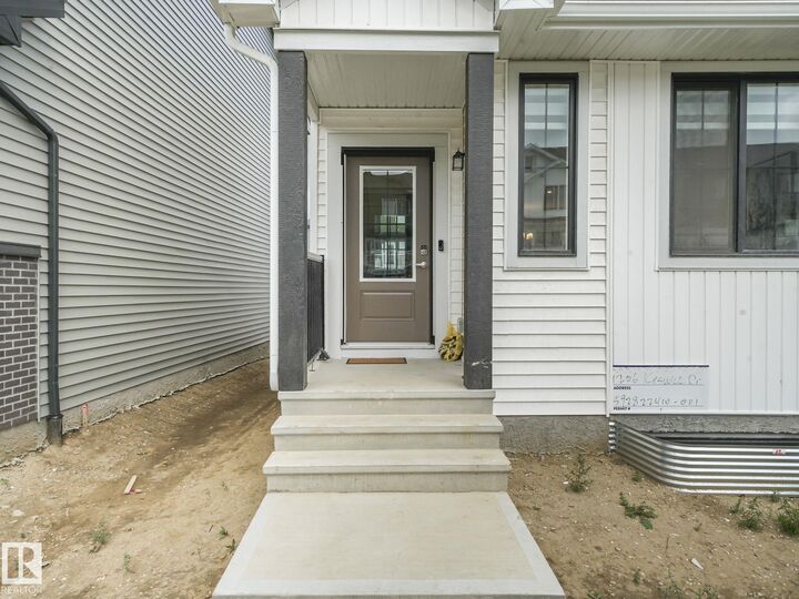 Property Photo: 1206 Keswick Drive SW AB T6W 4J9