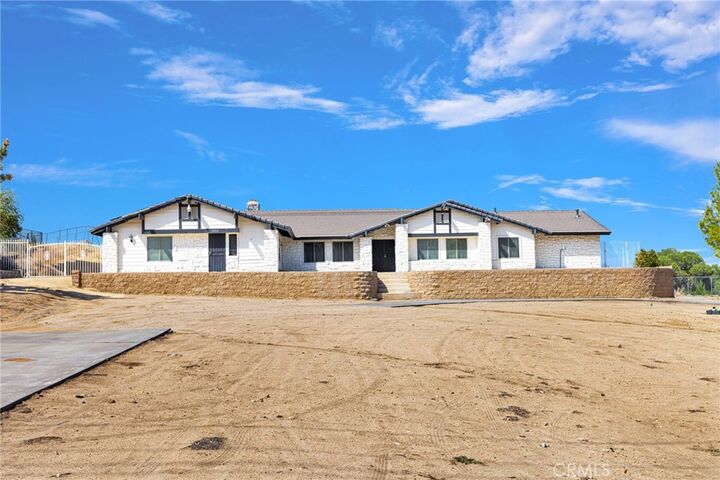 Property Photo:  14942 Riverside Drive  CA 92307 