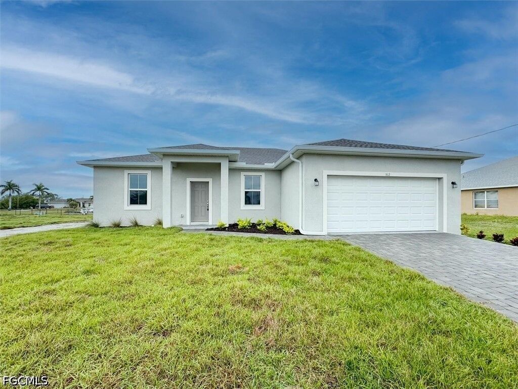 Property Photo:  512 NW 25th Avenue  FL 33993 