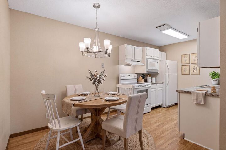 Property Photo:  4 Pine Tree Drive 215  MN 55112 