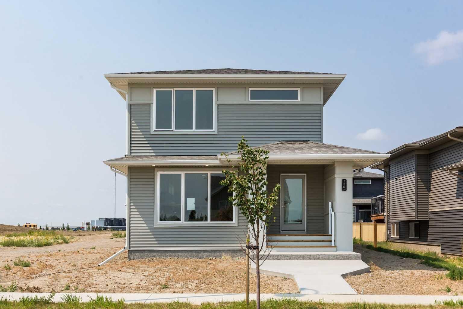 Property Photo:  320 Aquitania Boulevard W  AB T1J 5T4 