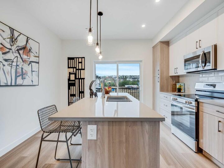 Property Photo:  2231 81st Street SW 105  AB T3H 6M4 