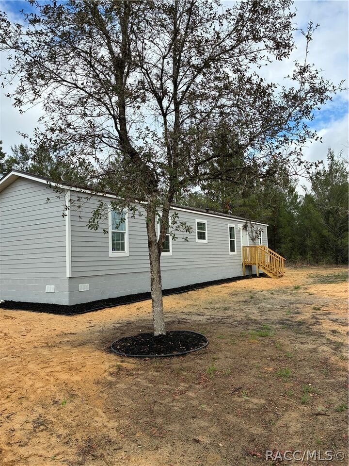 Property Photo:  544 Main Road  FL 32148 