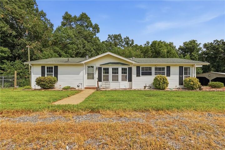 Property Photo:  3028 Quaker Church Road  NC 27043 