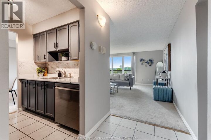 Property Photo: 9099 Riverside Drive East 319E ON N8S 4P9