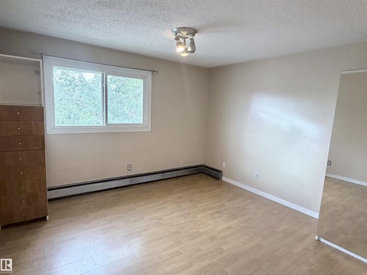 Property Photo: 11340 124 Street NW 306 AB T5M 0K1