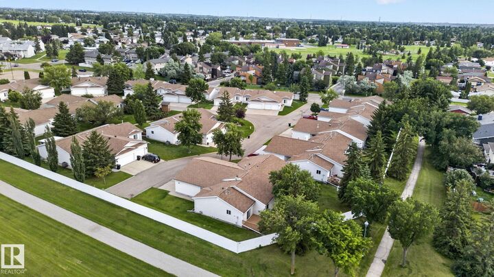 Property Photo:  8146 27 Avenue NW  AB T6K 4C9 