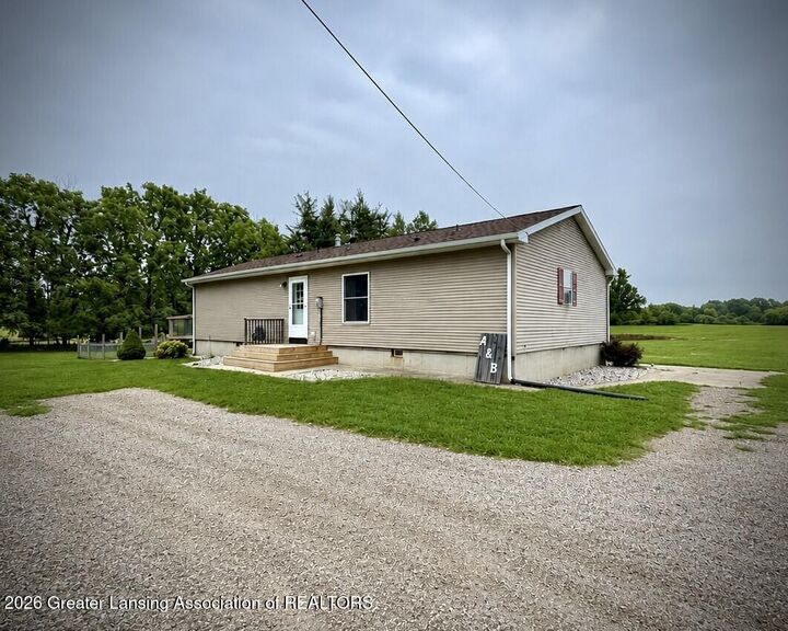 Property Photo:  8271 Corrison Road  MI 48837 