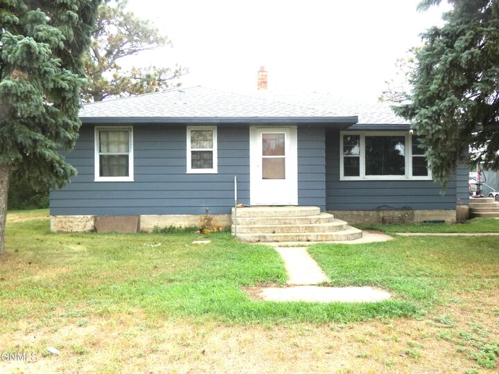 Property Photo:  6622 11th Avenue SE  ND 58544 