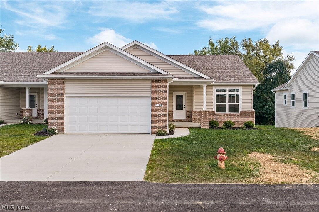 Property Photo: 1119 Queen Anne Drive NW OH 44647