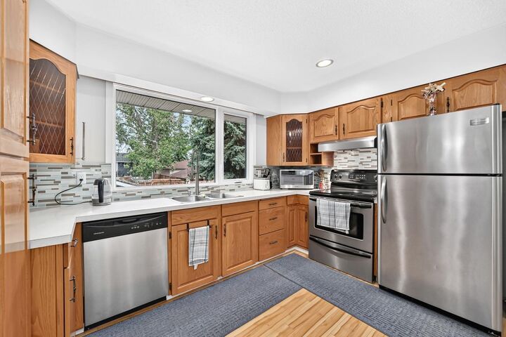 Property Photo: 1008 Cantabrian Drive SW AB T2W 1L7
