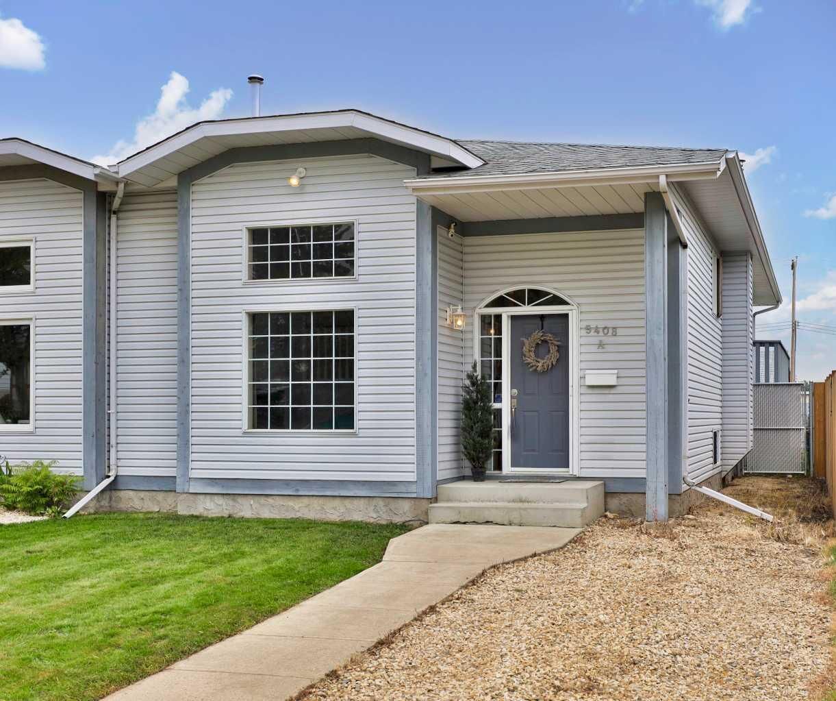 Property Photo: 5408A 52 Street AB T4V 4A6