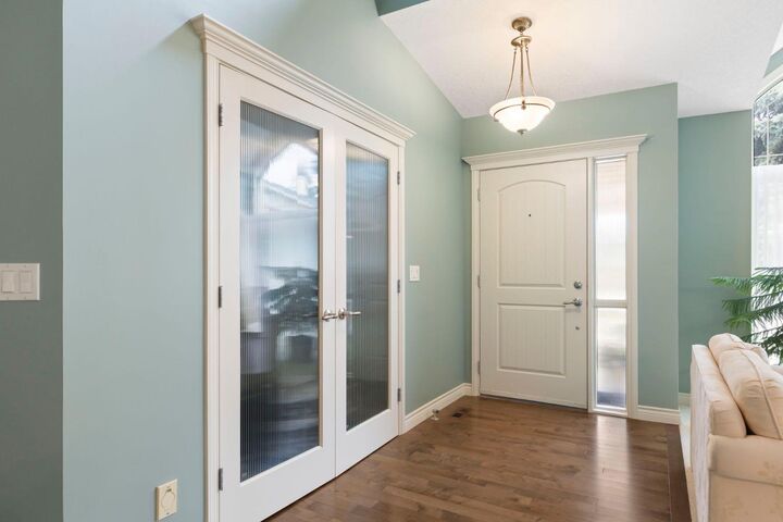 Property Photo: 311 Woodhaven Bay SW AB T2W 5S2