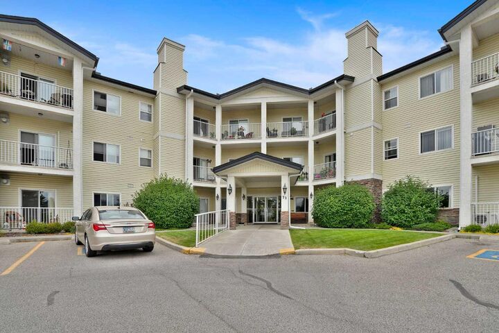 Property Photo: 72 Quigley Drive 115 AB T4C 2K6
