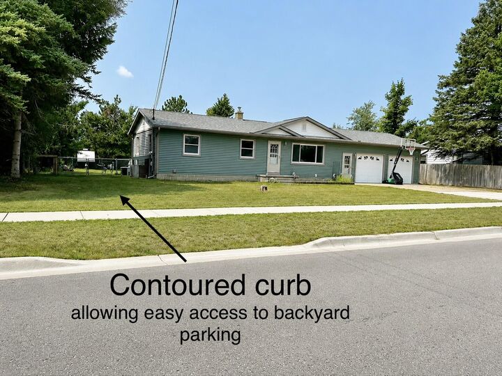 Property Photo:  809 Clover Drive  MI 49735 