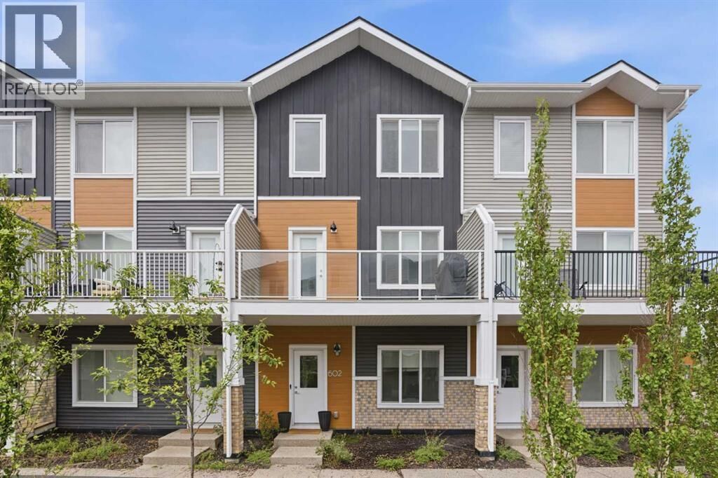 Property Photo: 335 Creekside Boulevard Southwest AB T2X 5L1