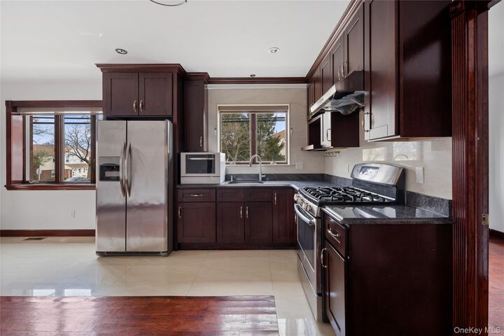 Property Photo:  6903 Cloverdale Boulevard  NY 11364 
