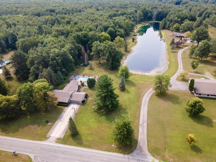 Property Photo:  21645 Swan Creek Road  MI 48637 