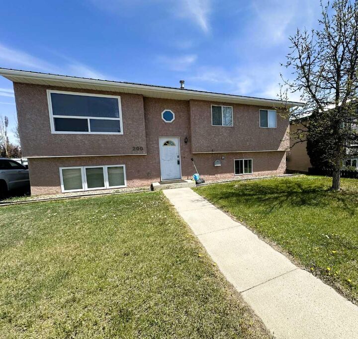 Property Photo: 200 Upland Boulevard W AB T1R 0R1