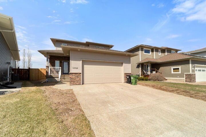Property Photo: 3702 76 Street AB T4V 5E3