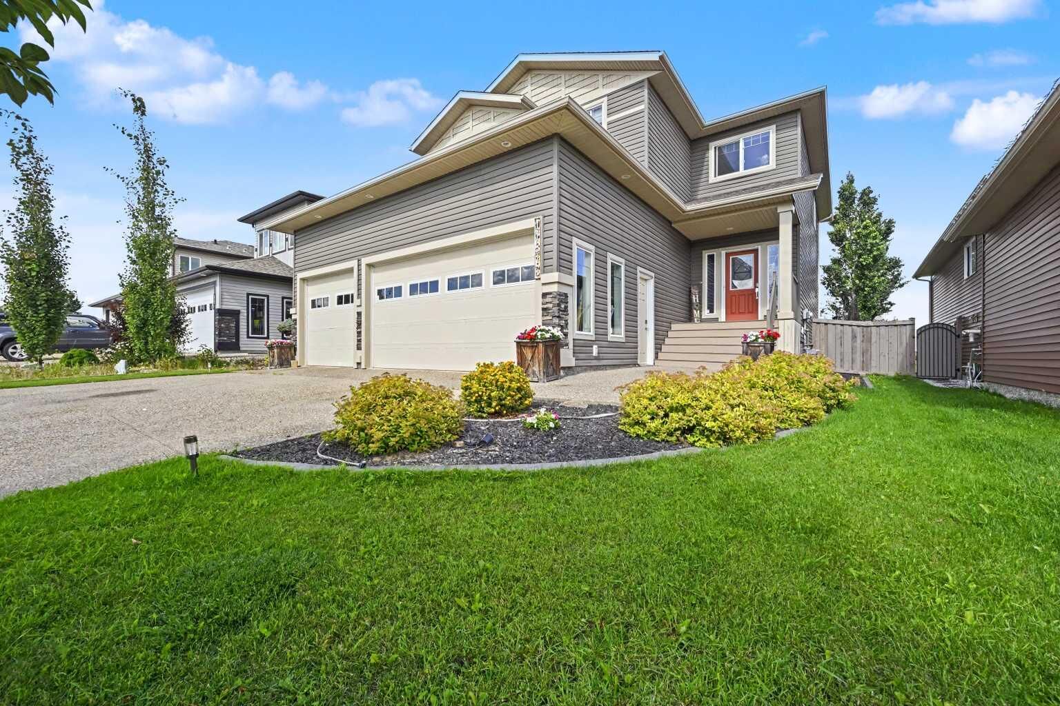 Property Photo: 11813 86A Street AB T8X 0H4