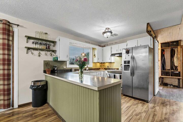 Property Photo: 94079 113 Range Road AB T0K 0G0