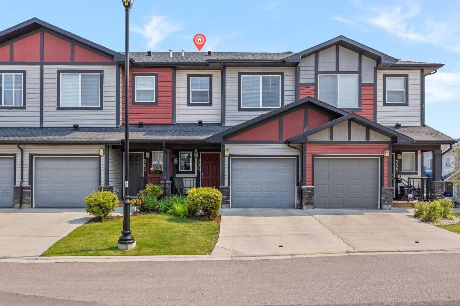 Property Photo: 304 Jumping Pound Common AB T4C 2L1