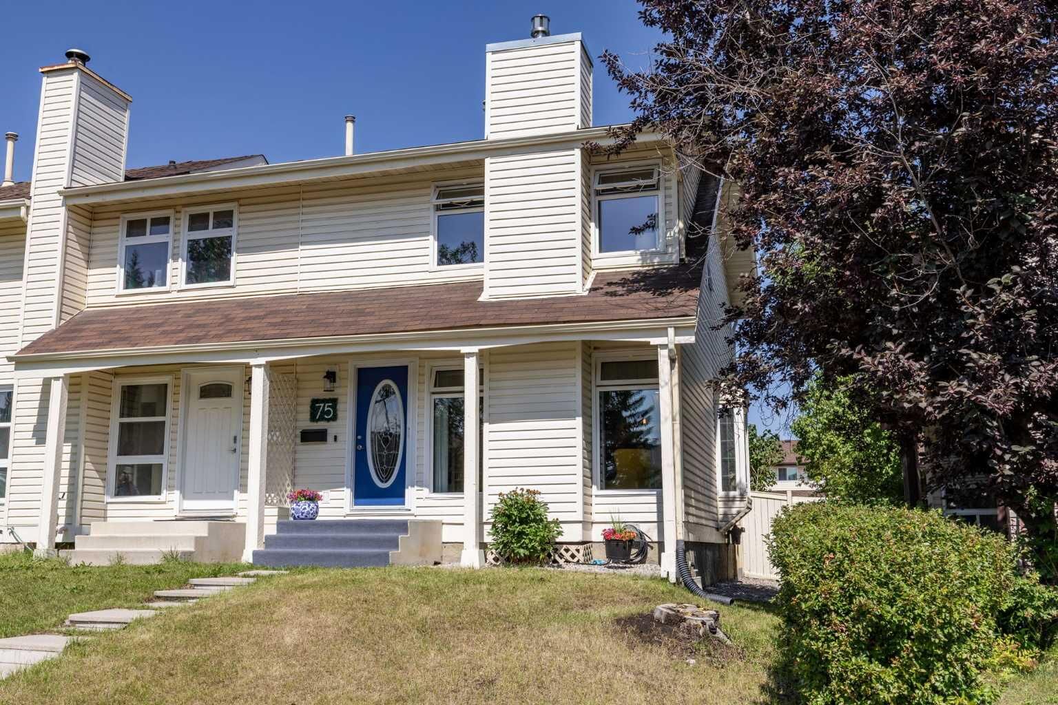 Property Photo: 75 Woodhill Court SW AB T2W 3P1