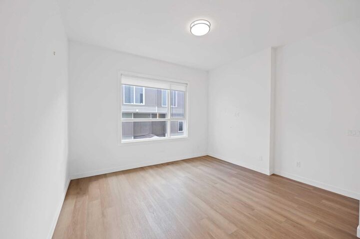 Property Photo: 101 Panatella Square NW 209 AB T3K 2R9