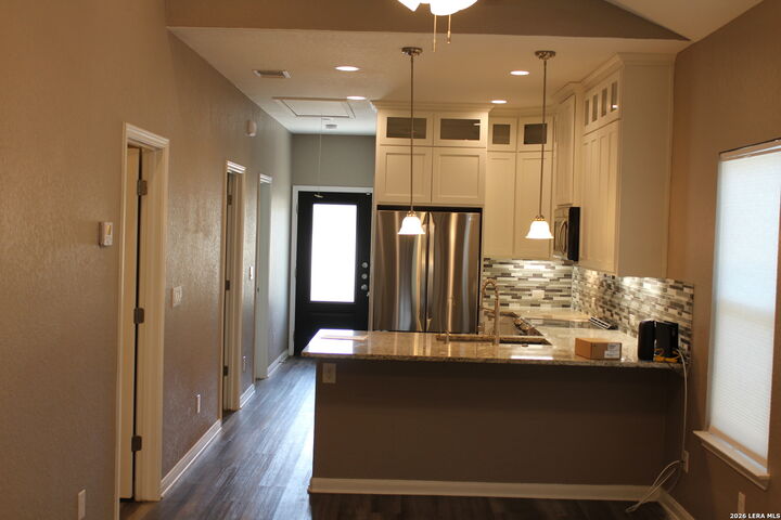Property Photo:  1303 Lombrano St  TX 78207 