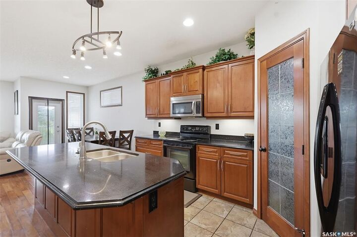 Property Photo:  206 Muzyka Road  SK S7W 0G9 