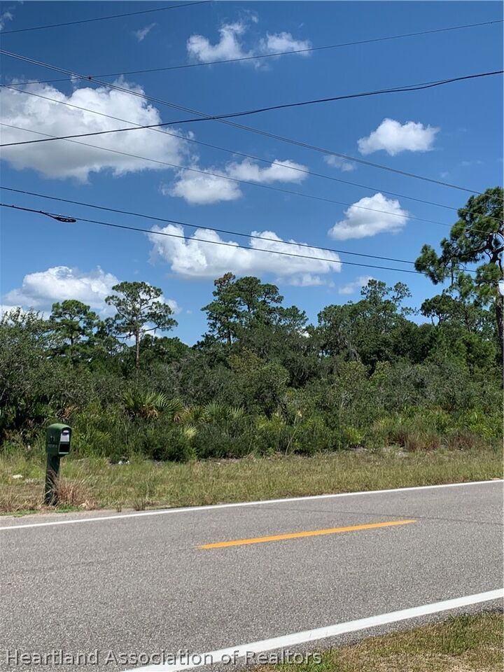 Property Photo: 10006 S Orange Blossom Boulevard FL 33875